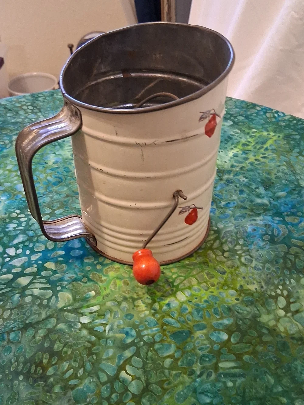 Vintage Cream Metal Flour Sifter with Red Apple Motif